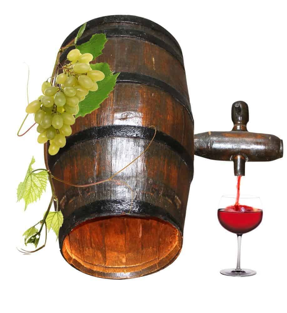 Barrel and glass of red wine