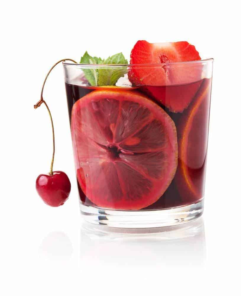 Refreshing fruit sangria with strawberry, orange and cherry