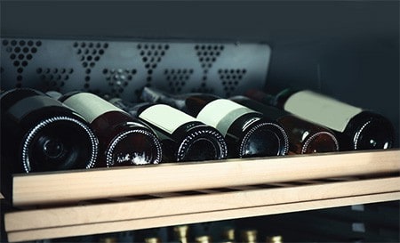 wine fridge rack with wine