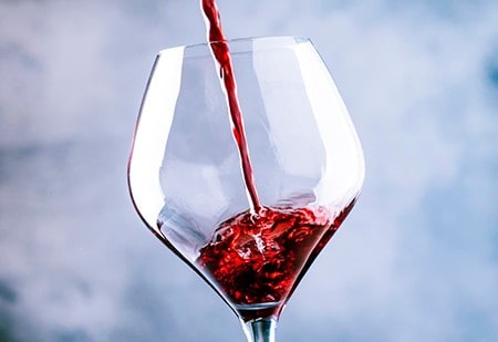 Pinot Noir poured in glass