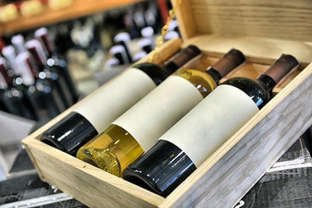 wine bottles in a wooden box