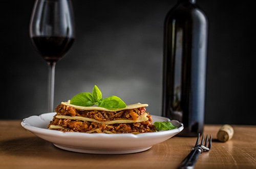 Lasagna bolognese and wine