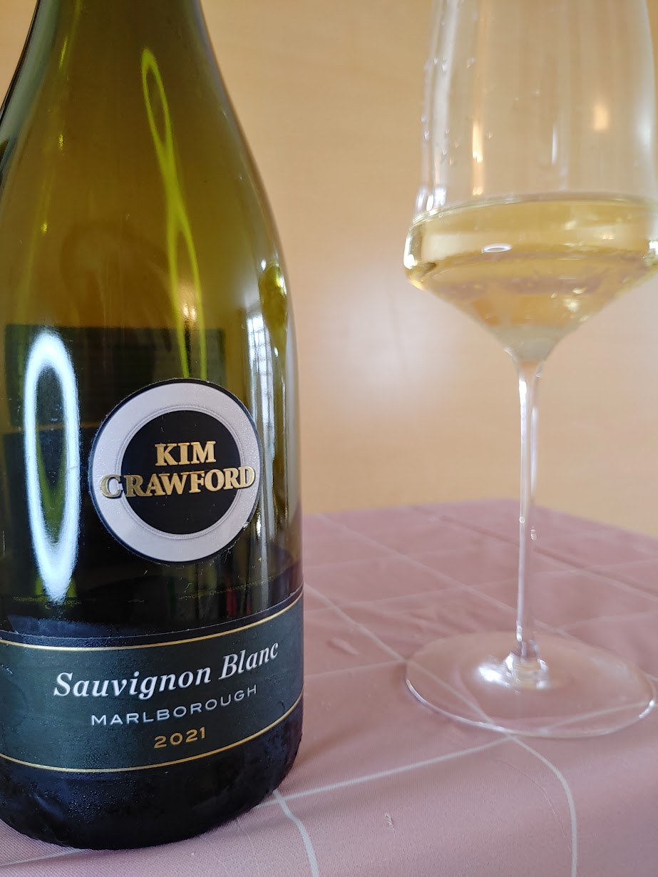kim crawford wine bottle and glass