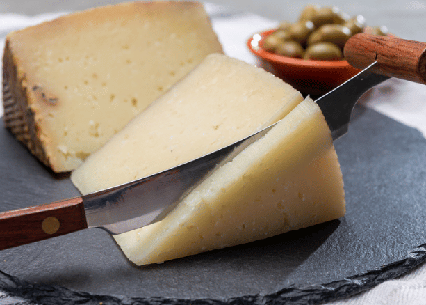Manchego cheese on board