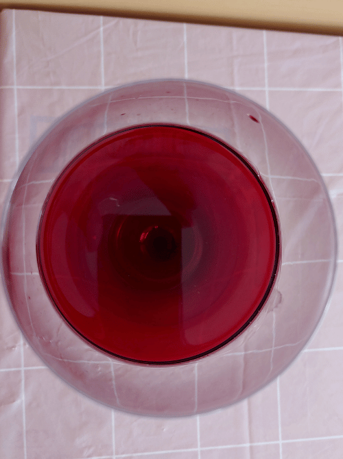 apothic cab in wine glass from above